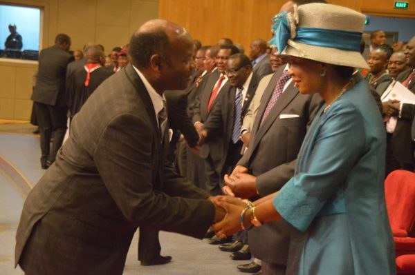 1st Lady Madam Getrude Mutharika grrets Bishop Geoffry Matoga preacher in English at the Prayers.