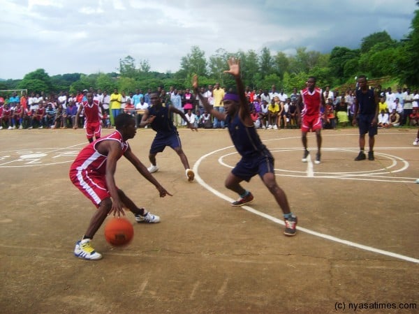 Muunguzi school court in Zomba; Players in action at baskteball match