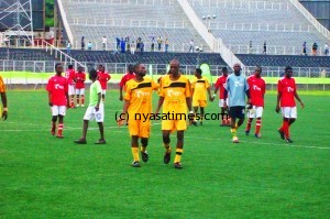 Tigers: Charles Ngosi and a colleague after the final whistle