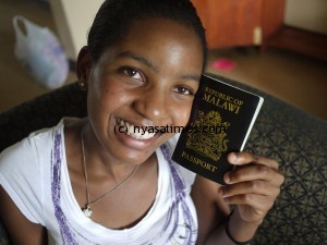 passport malawi Enettie Malangano showing off her new Malawian passport