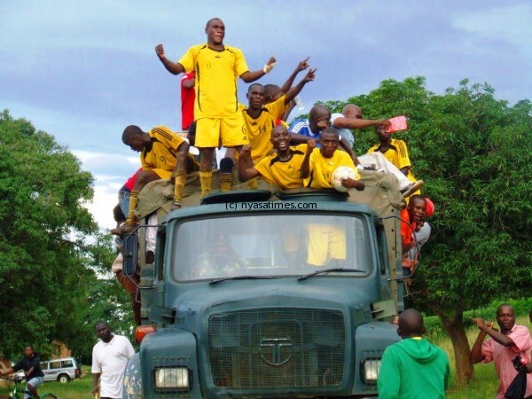 Kamuzu Barracks players cerebrating their victory into the Super League