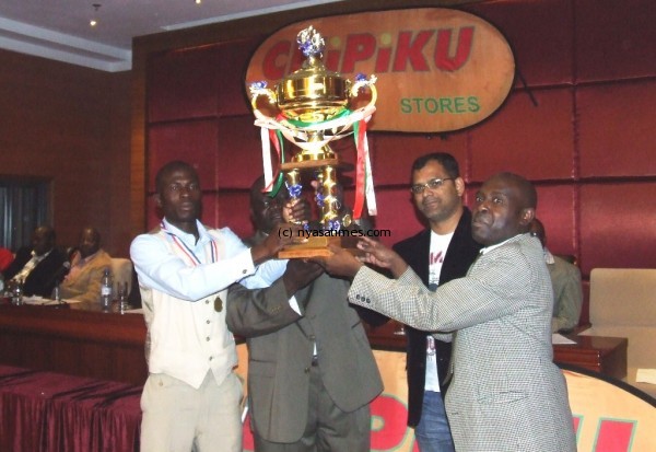 KB Captain Ted Thuwala receiving the trophy