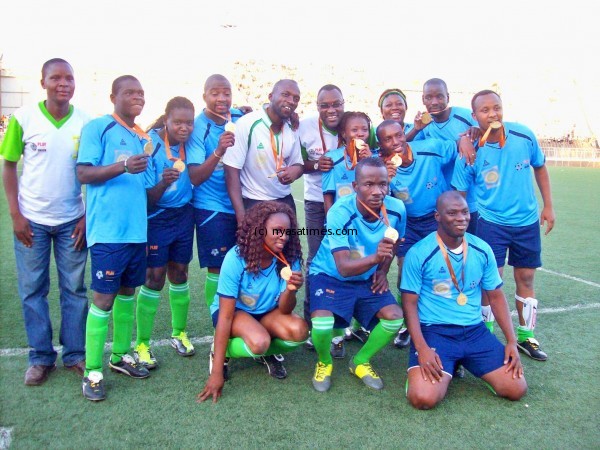 Jaguar players showing their medals