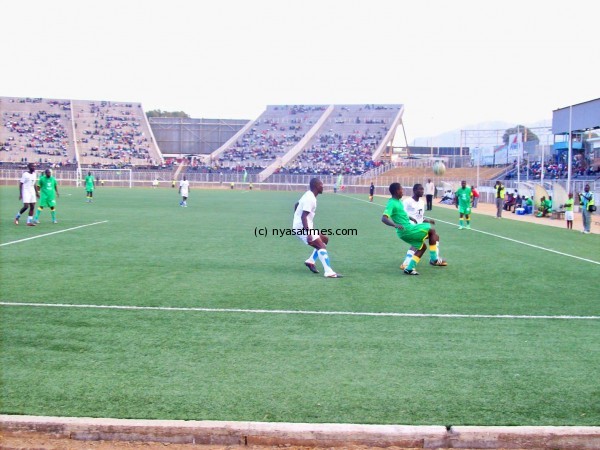 Benard Harawa in thick of opponents