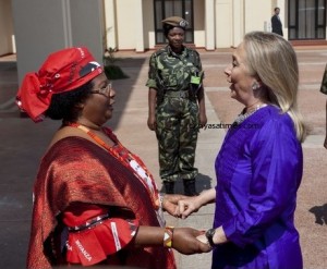 Stateswomen: resident Joyce Banda, left, greets U.S. Secretary of State Clinton at the State House in Lilongwe