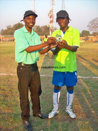 Chimbaka receiving his man of the match award