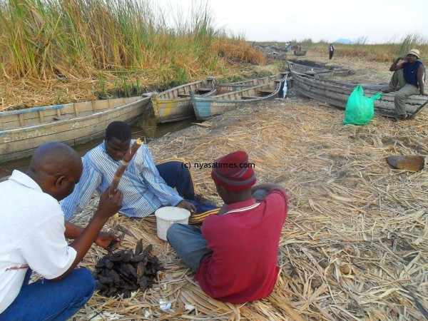 Fishermen at Lake Chilwa doing their business