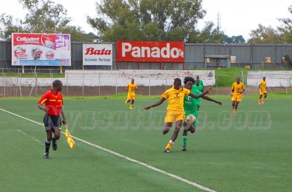 Tigers defender trying to shield the ball away from a Kabwafu player....Photo Jeromy Kadewere