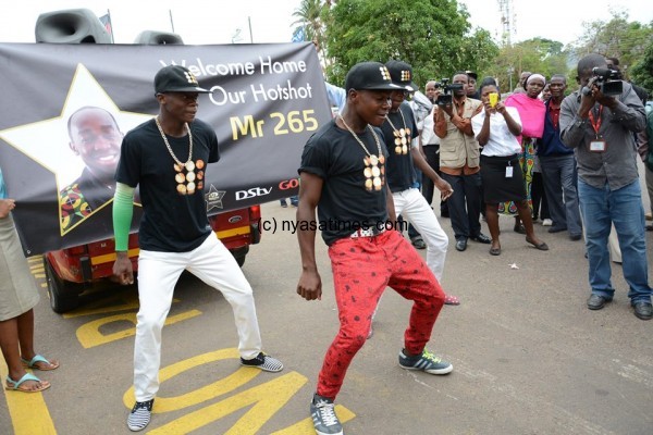 Malawi's Big Brother Hotshot Mr. 265 arrived via Chileka International Airport to a warm welcome.-Photos credit Thoko Chikondi, NPL