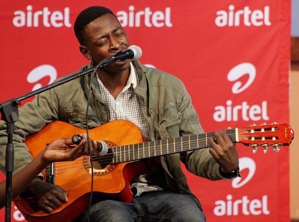 A Chanco student showing his singing and guitar skills in the Unima Got Talent show. Photo by Kimpho Loka