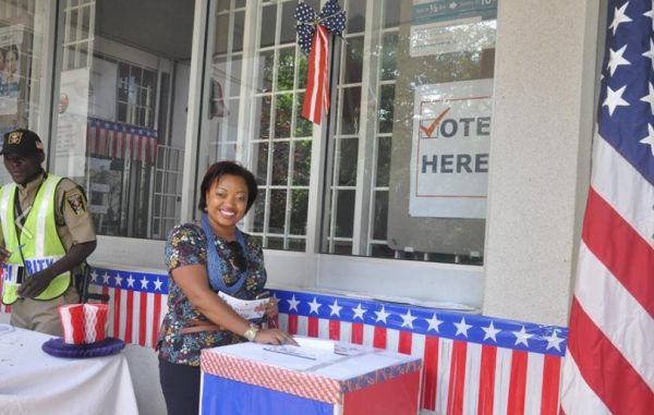 Fawzia Osman casting a ballot