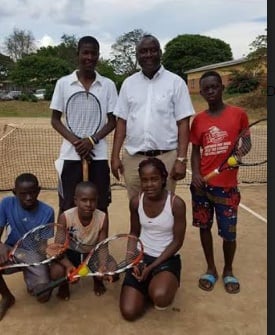 Mwenefumbo with the tennis players