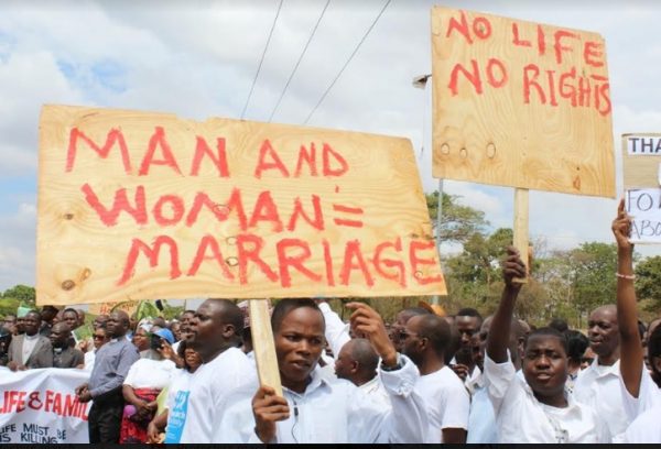 Marchers for life display their placards