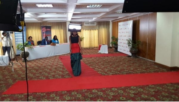 Mzuzu Technical College construction student garbed in Malawi flag at Miss Malawi2016 auditions in Mzuzu