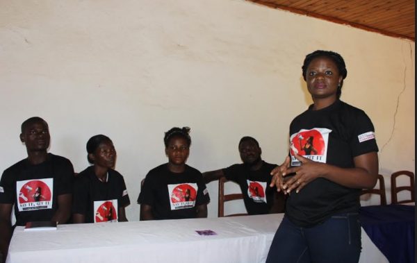Bandawe (standing) addressing the youth on safe sex