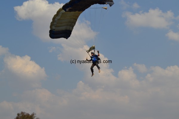 A banner ship lands with the trophy .-Photo by Alex Mwezalumo, Nyasa Times