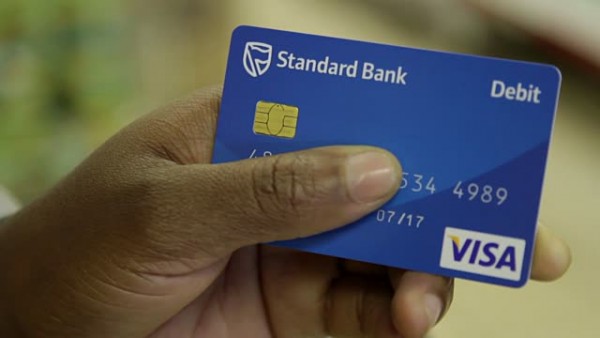 A customer holds a Standard Bank card