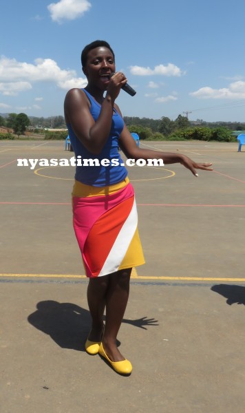 A female rapper entertains the crowd during the final