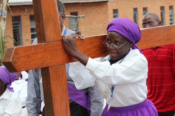 A woman carrying a cross...Photo Jeromy Kadewere