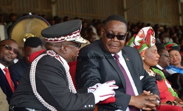 President Mutharika with former prison commissioner Kennedy Nkhoma, now in Home Affairs ministry