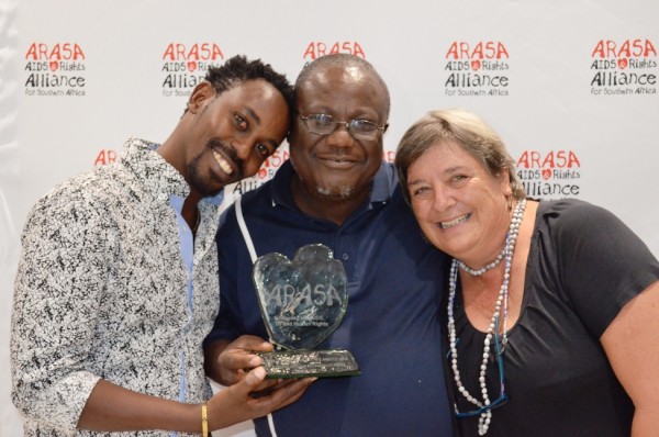 ARASA former Acting Executive Director, Bruce Tushabe (l), Pastor  Mataka (c), and ARASA Director, Michaela Clayton (r) pose for a photo (Pic. Courtesy of ARASA)