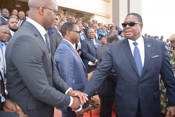 President Mutharika with his minister of home affairs , Atupele Muluzi after opening the House