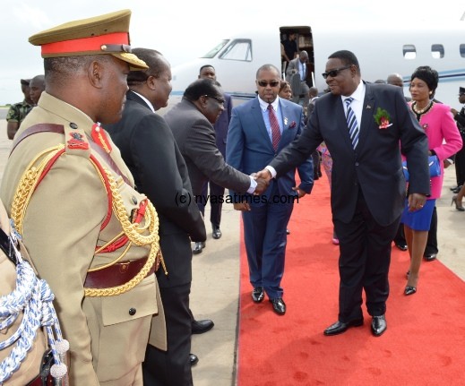 President Mutharika being welcomed by the Vice President and other Government Officials at KIA on his arrival from Ethiopia - Pic by Stanley Makuti