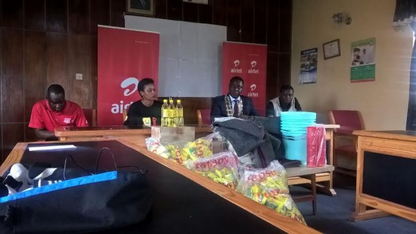 Airtel's Chavula handover the donated items to Mayor of Mzuzu City, William Mkandawire.