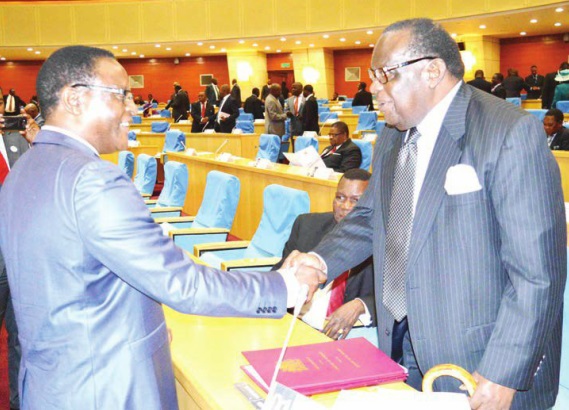 Flashback: Gondwe greets opposiiton leader Lazarous Chakwera (L) in parliament