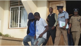 Ngulumbe being led to jail