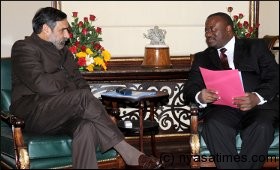 India's Minister for Commerce & Industry and Textiles Anand Sharma (L) and his Malawi counterpart Mr John Bande 