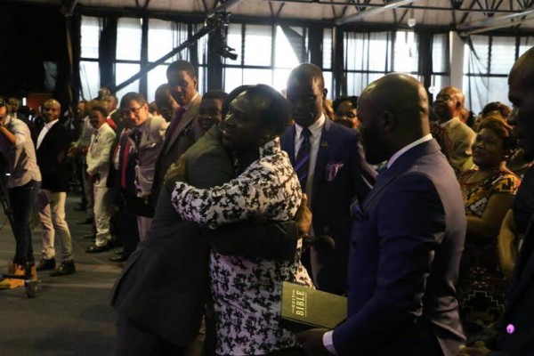 Apostle John Chi hugs Bushiri
