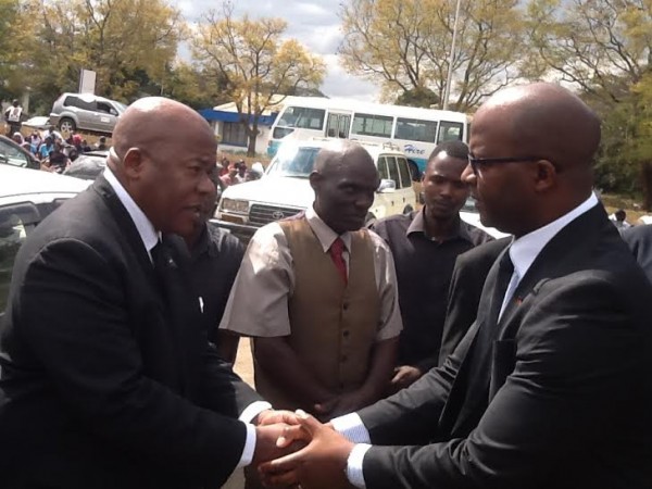 Atupele with Bruce Munthali at the ariport to welcome Nyondo's remains