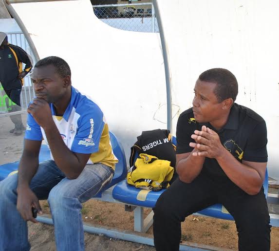 Azam Tigers bench led by coach Gerald Phiri (right) .photo by Jeromy Kadewere.