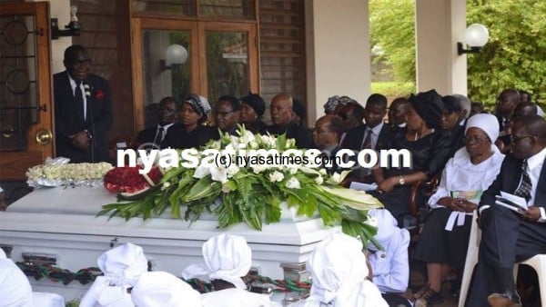 Ruth Tembo's coffin lies before streams of mourners in Dedza