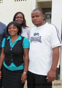 Bertha (left) in blue blouse