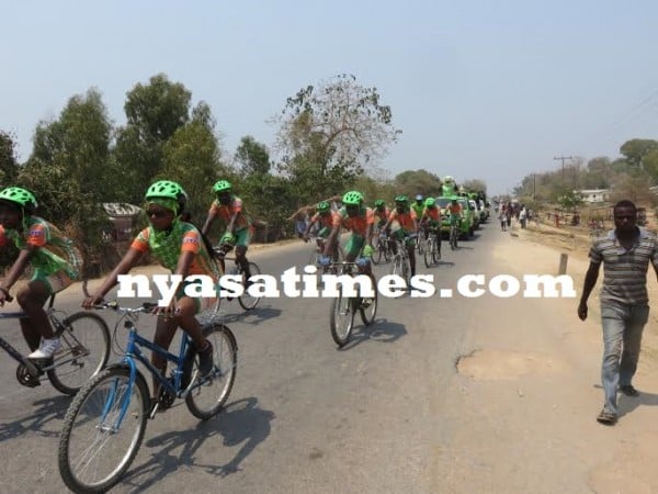 Bicycle riders lead the procession, Pic Alex Mwazalumo