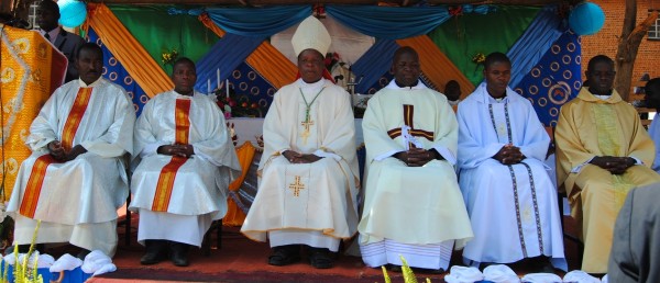 Bishop Kanyama ( centre) from left two priests who celebrated silver jubilee while to the right three deacons who were ordained priests...Photo Jeromy Kadewere