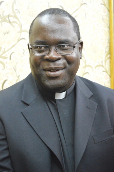 Bishop elect of Zomba Diocese Desmond Tambala (C) Stanley Makuti
