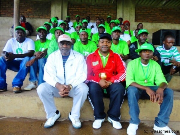Blantyre United technical director Lawson Nakoma posing with the team.....Photo Jeromy Kadewere
