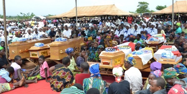 Bodies of Eight peaople killed by Lightening capuctured during the Funeral Service. pic by Felix Washon. MANA.