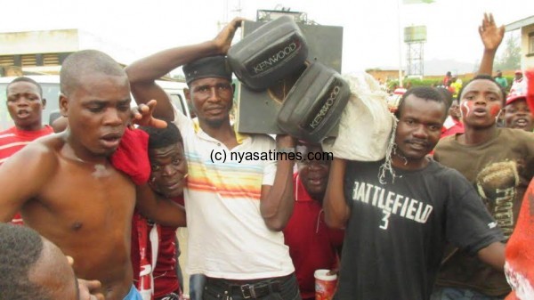 Bullets fans came with a music systen  and a battery car to cheer their team.-Photo by Jeromy Kadewere