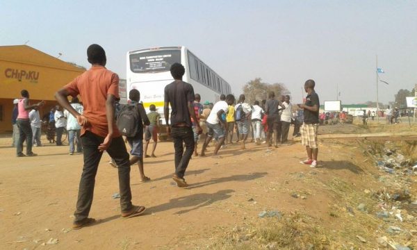 Bus enroute to Zambia caught in the fracas. Pic by Sarah Munthali, Mana.