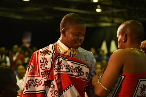 Bushiri being dressed in African attired by delegates from Swaziland