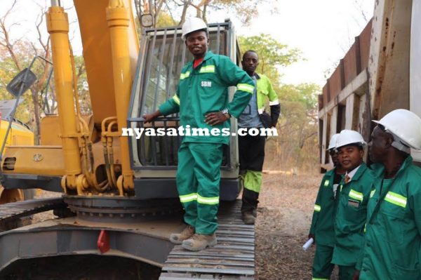 Bushiri inspecting machinery at the mine site in Ndola - Photo by Klevin Sulunguwe 