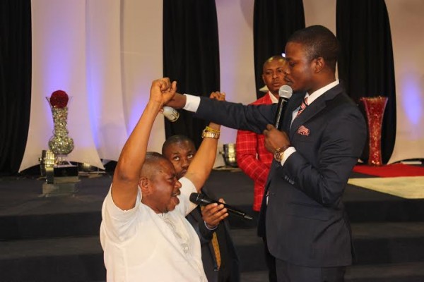 Bushiri praying for the Nigerian politician