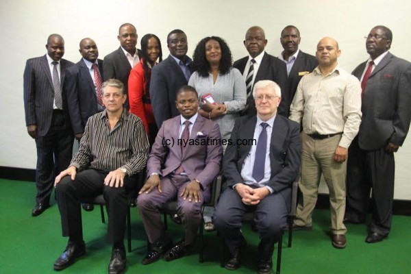 Bushiri (deating on the centre) president of AFRICCI and members during a group photo in South Africa