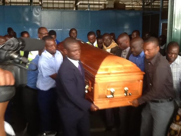 Carrying the casket of Nyondo