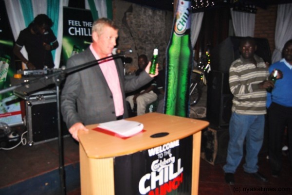 Carslberg Malawi top official on the podium doing the Chill toast....Photo Jeromy Kadewere