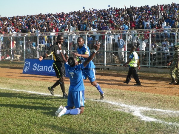 Celebrating the spiritual way, defender Francis Mlimbika (7), Pic Leonard Sharra, Nyasa Times